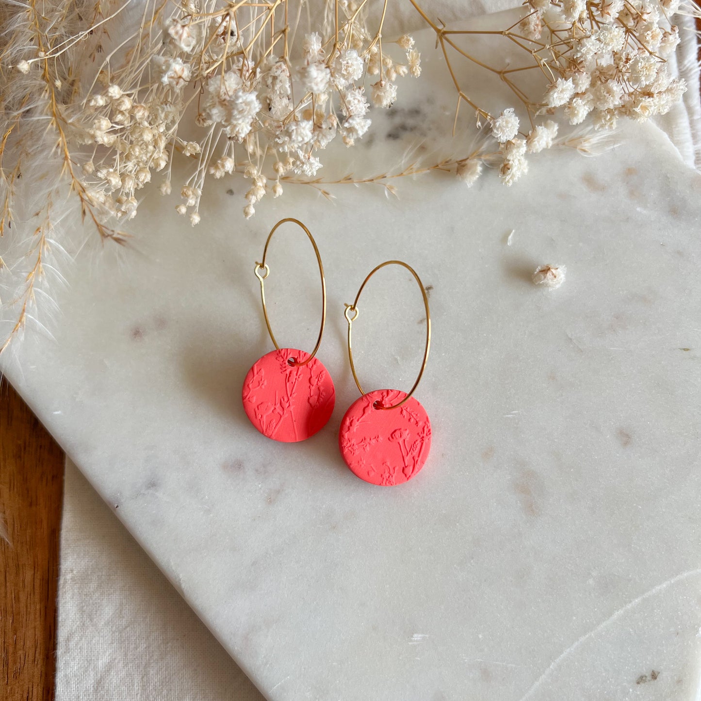 HIGAN KELGH | round drop on 30mm hoop earrings in blossom textured bright coral red