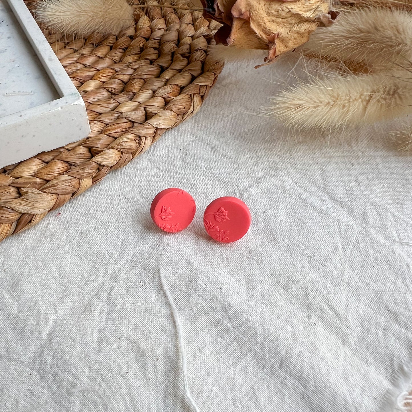 ROUND | Medium round blossom textured stud earrings in bright coral red