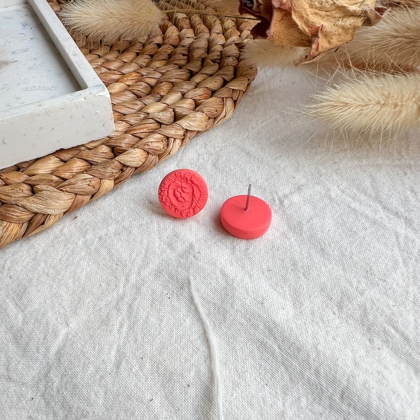 ROUND | Medium round flower textured stud earrings in bright coral red